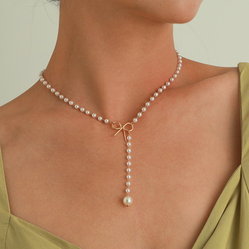 Bewitched Fizah's  Pearl and Gold Bow knot Necklace